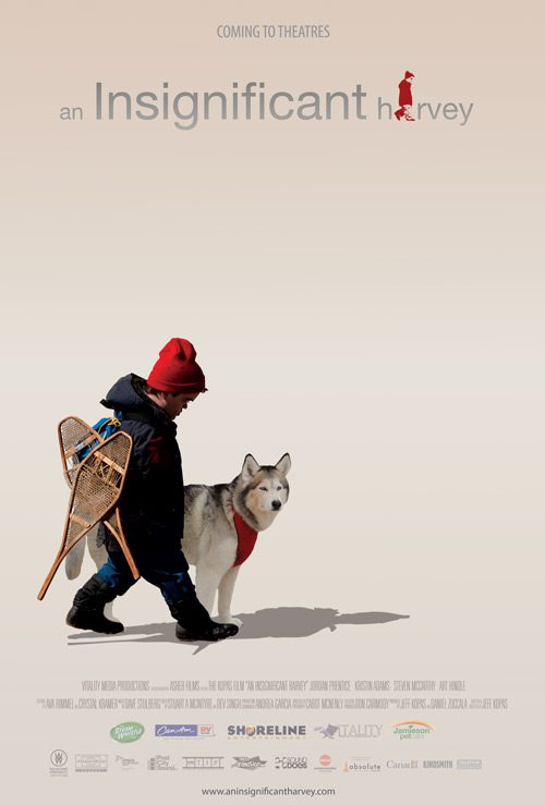 Child with snowshoes and dog